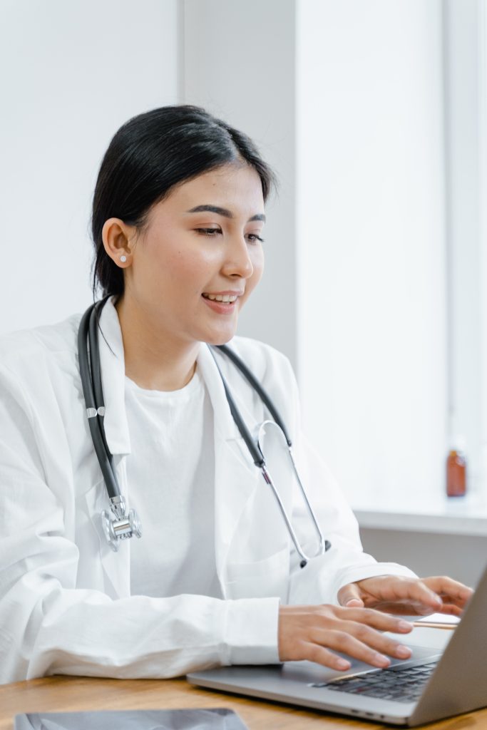 A doctor on her computer