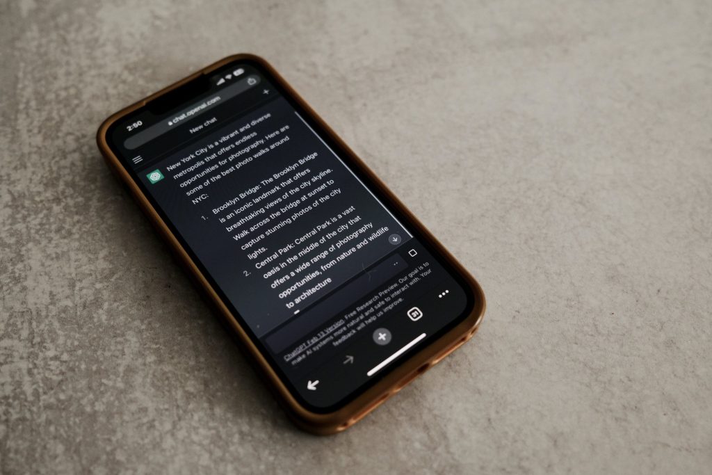 A cell phone with its browser open to chat gpt