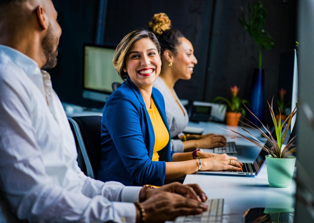 Employees working at a desk