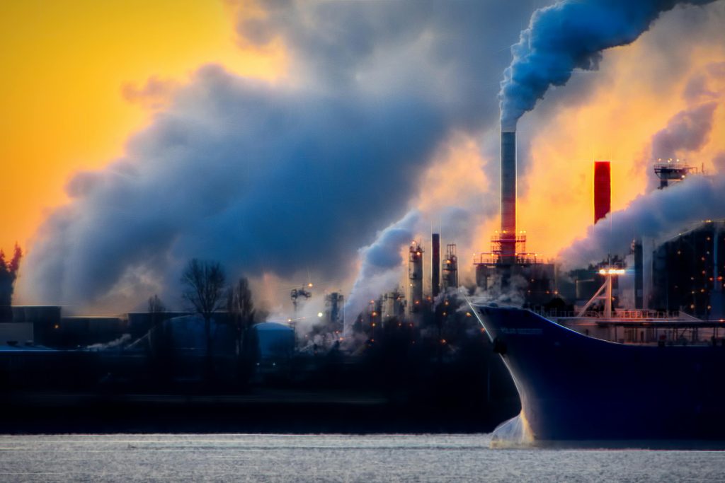 Black ship emitting smoke